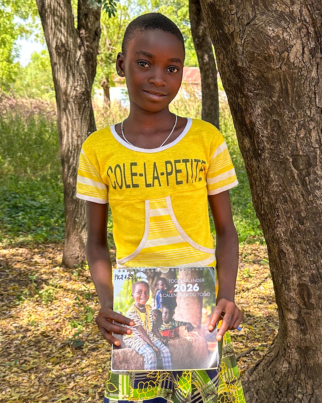 Patenkind mit Togokalender